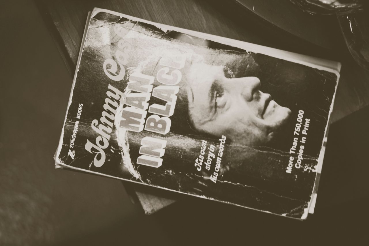 Offerings Old book cover featuring biography of a legendary musician in sepia tone.